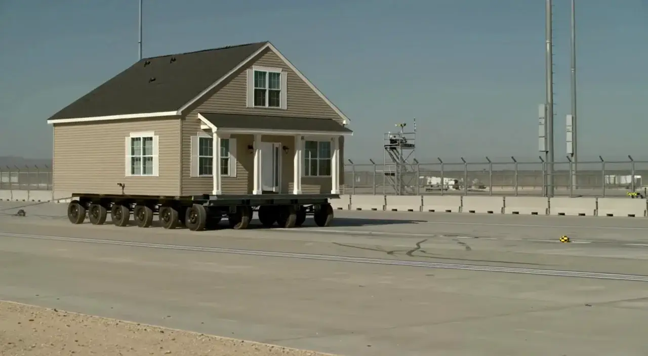 Suburban house rolling on a multi-axle trailer generated with FLUX 3
